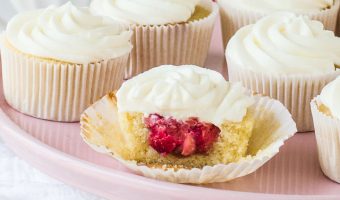 strawberry shortcake cupcakes on a cake stand