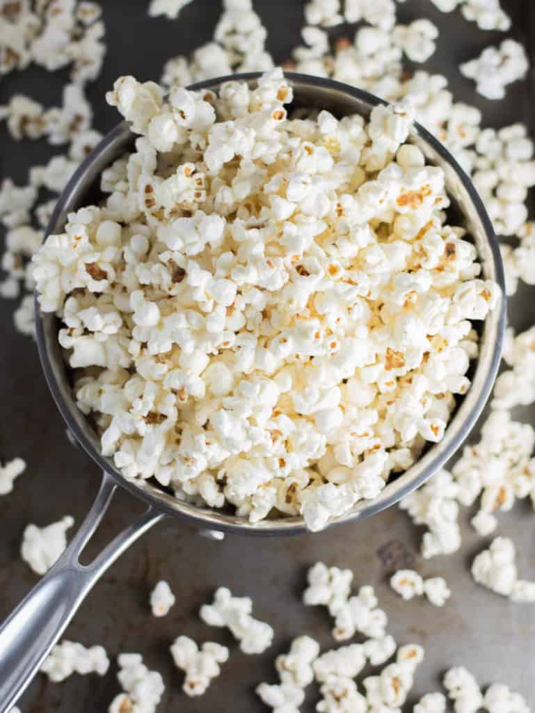 popcorn in a bowl before the caramel sauce has been added to make Nutella caramel corn