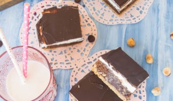 Chock full of nutty flavor, these triple decker hazelnut brownies are sure to please all the chocolate + hazelnut lovers in your life.