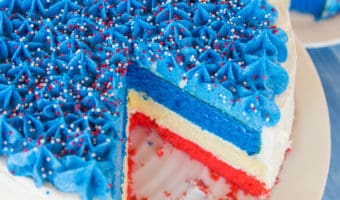 This Fourth of July cheesecake cake is a festive summer dessert, and is easier to make than you’d think!