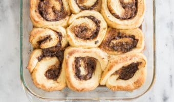 A recipe for homemade overnight salted caramel chocolate cinnamon rolls. They make a decadent breakfast or brunch, perfect for holidays and special occasions.