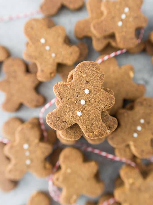 overhead photo of stacked gluten-free dog treats decorated with cream cheese 'buttons'
