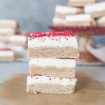 Chai spiced sugar cookie bars with cream cheese frosting are an easy and delicious Christmas cookie you’ll want to bake all winter long. Add some spice to your Christmas cookie trays with these beauties! recipe via itsybitsykitchen.com #sugarcookies #chaispice #cookiebars