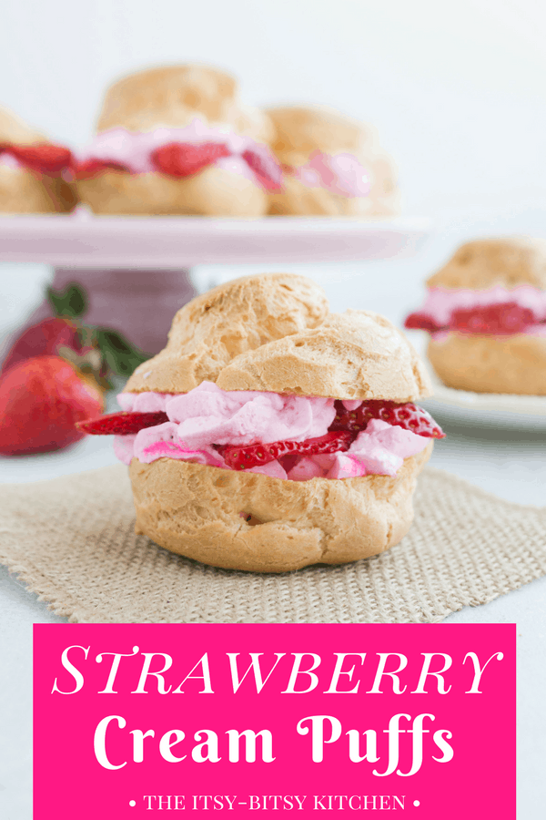 Pinterest image of strawberry cream puffs sitting on a piece of burlap with text overlay that says "strawberry cream puff"