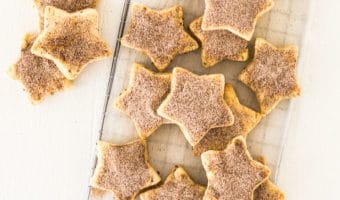 over head photo of a pile of biscochitos on a wire rack