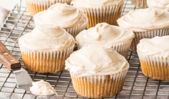 frosted maple cupcakes on a wire rack